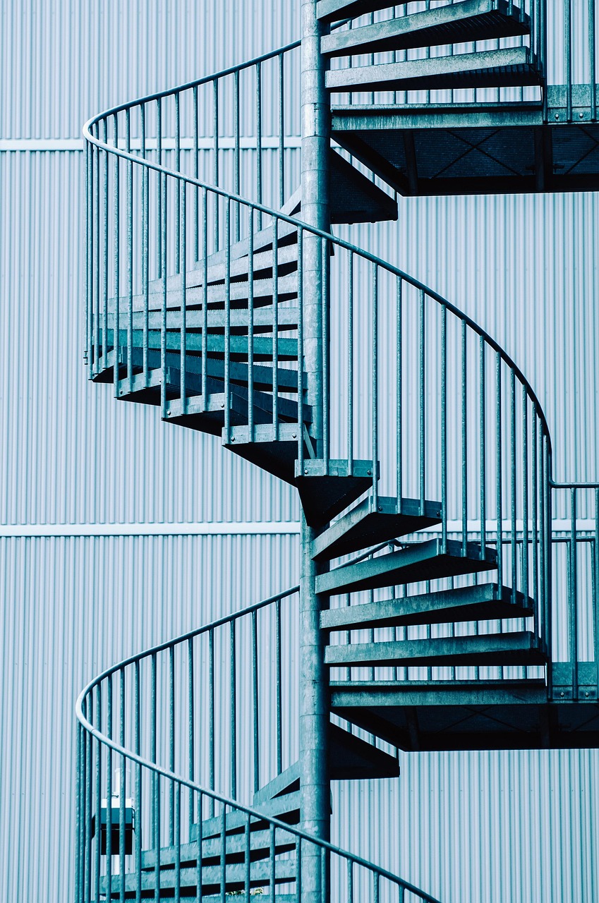 g62d89f691e70b413f6113340cb2b51e718c88e0185ea6a281bb777d3dfc9464616a8c432bf33fee88a8ed751ad2f4ccf463d2cc7f368696e4fa9471767a4b7fb_1280-6651876 spiral staircase, stairs, fire escape, emergency staircase, staircase, spiral, steel, building, architecture, spiral staircase, spiral staircase, spiral staircase, spiral staircase, spiral staircase, fire escape